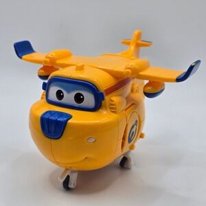 Super Wings Donnie Transforming Toy Yellow Plane Robot Figure